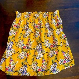 Yellow floral mini skirt. Size medium, brand Blue Rain